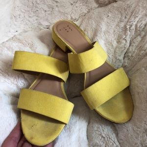 Yellow slip on mules